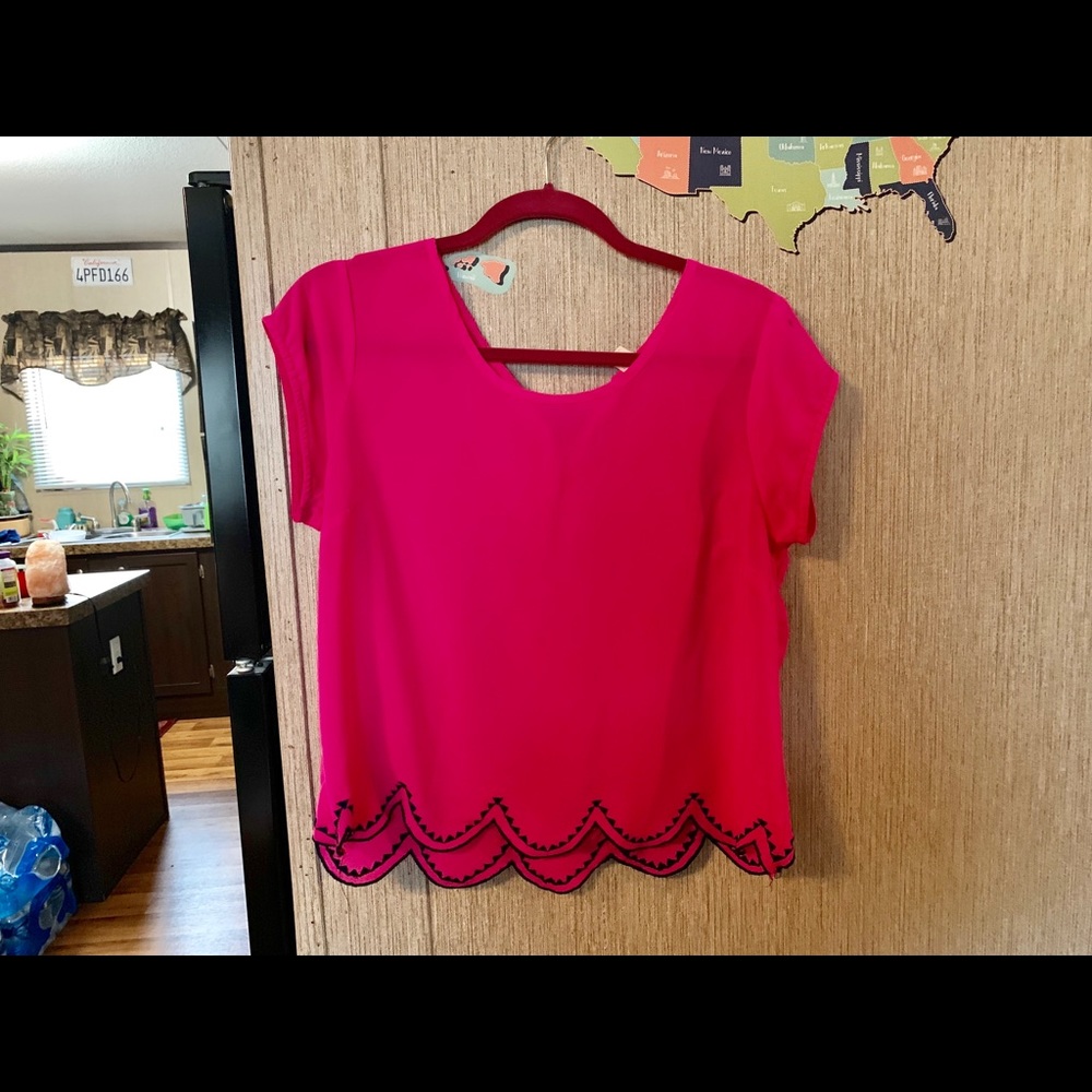 Hot pink blouse.